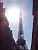 The Eiffel Tower next to the sun (598x)