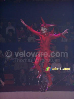 Pricklesuit on a bike on a cord (384x)