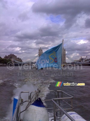 The Tour in London flag in front of the Tower Bridge (642x)