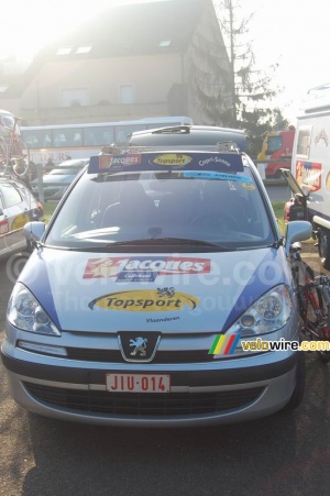 A car of the Chocolade Jacques cycling team (932x)
