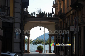 An idyllic street and the lake of Lugano (581x)